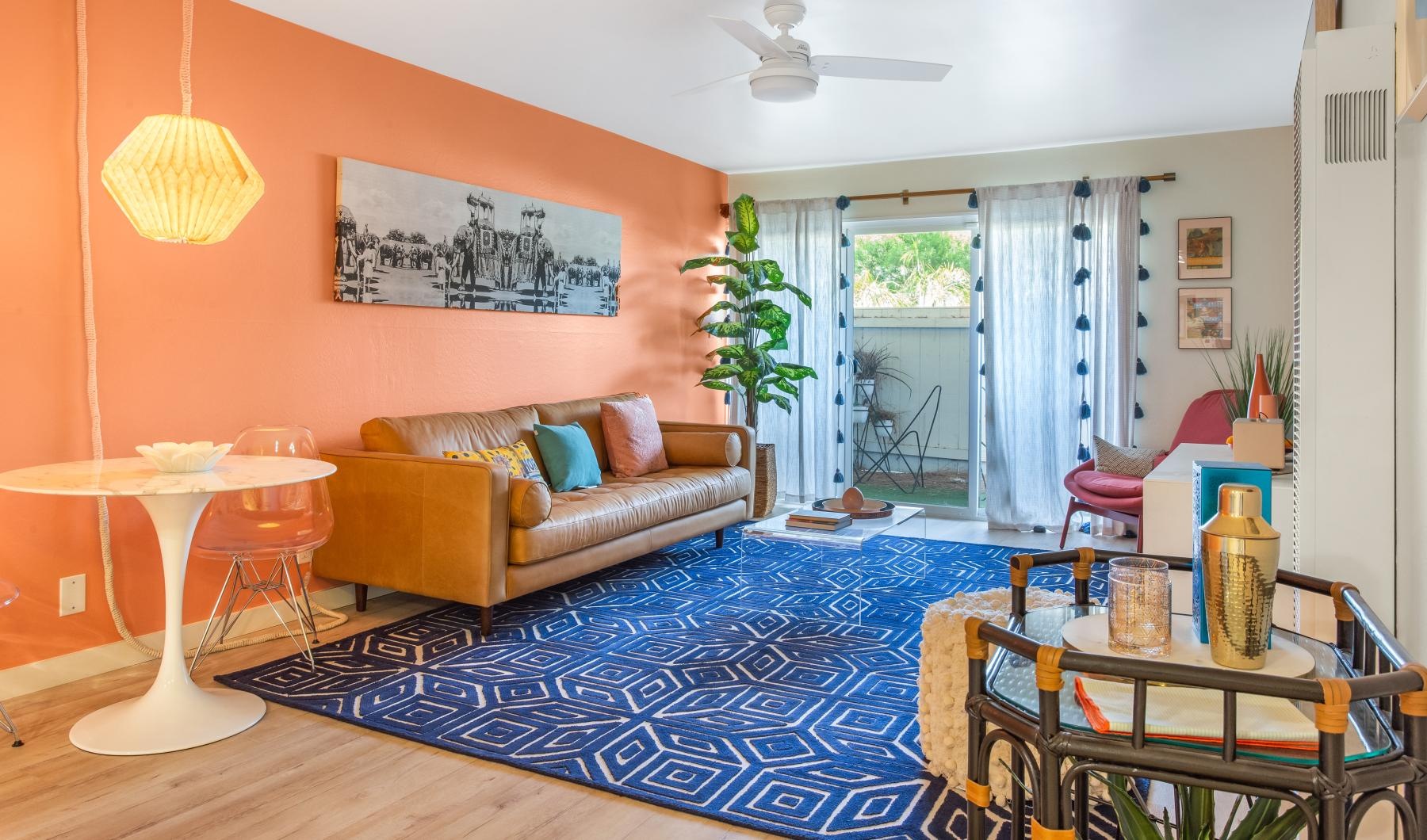 a living room with a rug