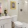 a bathroom with a shower unit and toilet