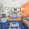 a living room with a couch and a table