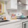 a kitchen with white cabinets
